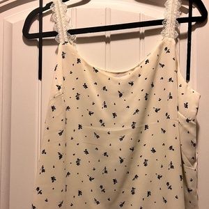 Sleeveless white tops